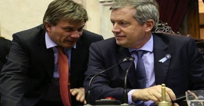 Eduardo Ezequiel Figueroa, empleado de la Cámara Baja, junto a Emilio Monzó